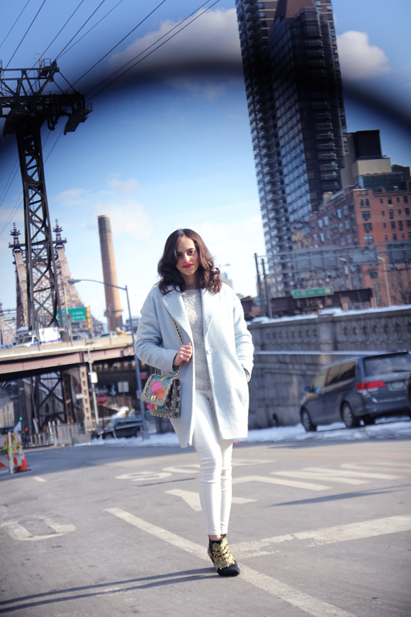 NYC Outfit : Blue coat, white jeans and Angel Jackson Disco Rainbow Jai Bright Bag