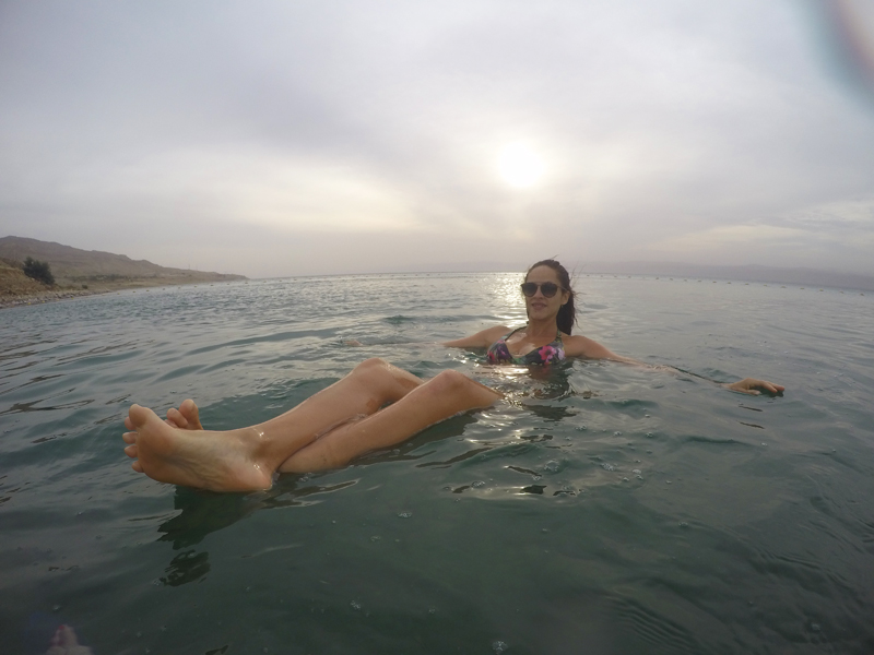 Jordan itinerary 8 days - Jordan places to visit - travel blogger bathing Dead sea Jordan