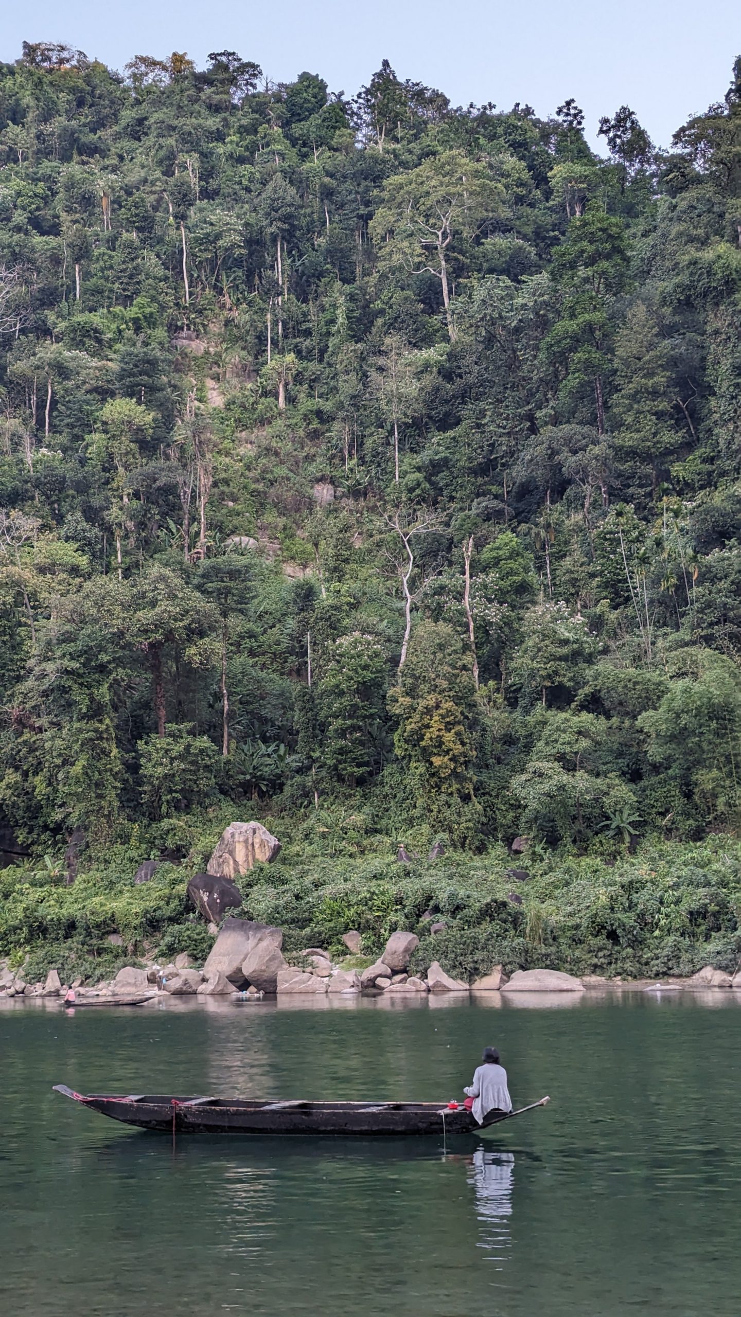 Villager on Umngot river Northeast India Meghalaya