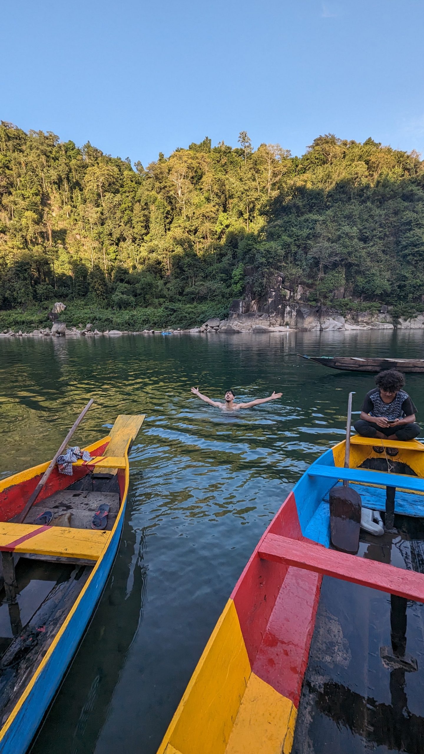 Travel blogger swimming Umngot river Northeast India